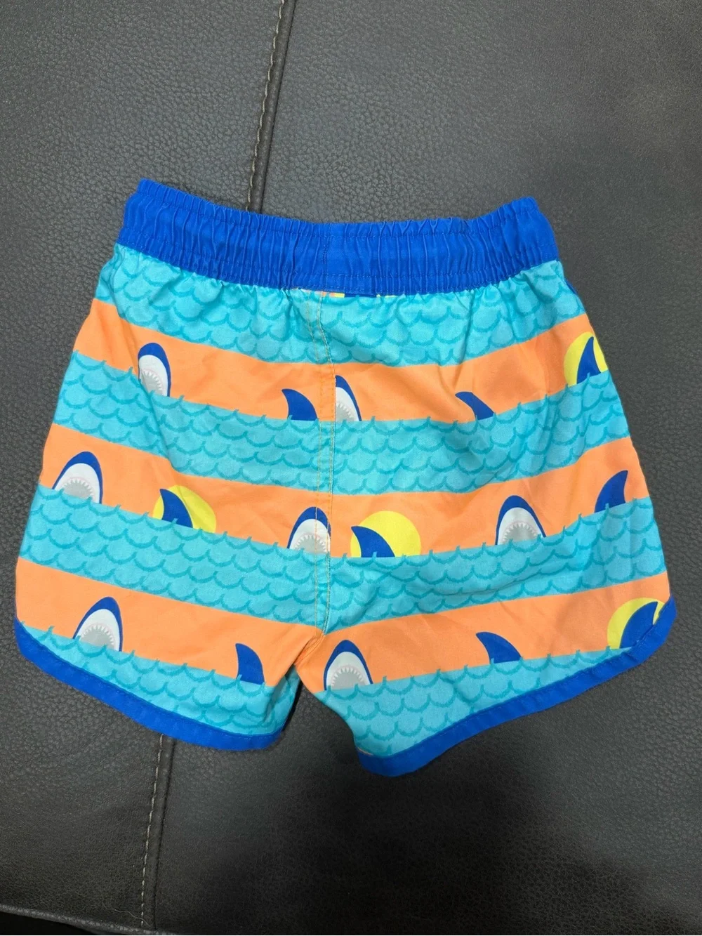 Boys Blue & Orange Shark Stripe Swim Trunks